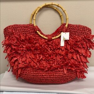 Orange Woven Tote Bag with Bamboo Handles by Straw Studios.